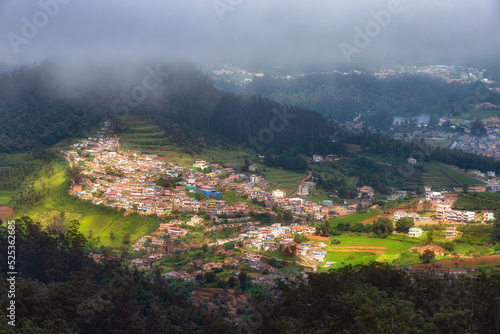 View of Ooty town from Doddabetta View Point, India. Doddabetta is the highest peak in the Nilgiri Mountains at 2,637 metres (8,652 feet). It is a popular tourist attraction