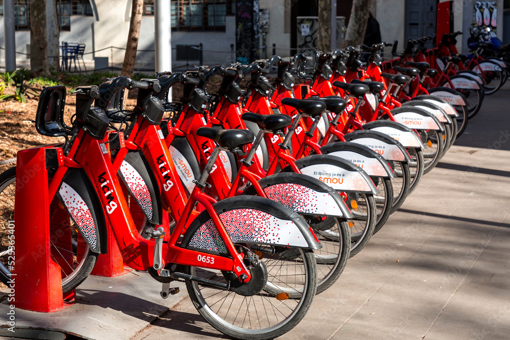 Bicing electric bikes parked at the charging station in Barcelona supported by Smou app Stock Foto Adobe Stock