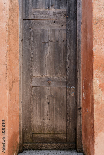 Old vintage wooden door. Travel concept. Traditional European old town building. Old historic architecture