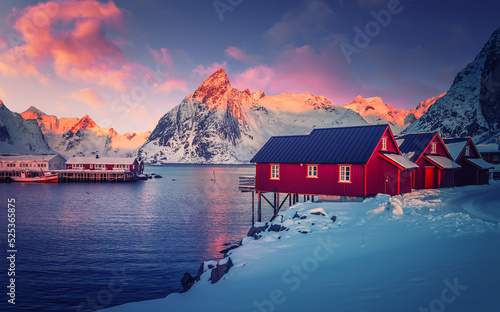 Платно Hamnoy fishing village on Lofoten Islands, Norway with red rorbu houses in winter