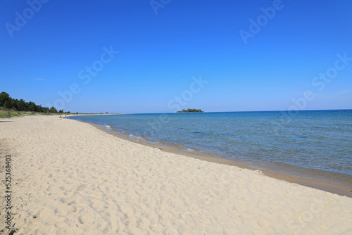 Fisherman s Island State Park is a public recreation area of 2 678 acres sitting on six miles of Lake Michigan shoreline southwest of Charlevoix  Michigan. The island is 900 feet offshore.