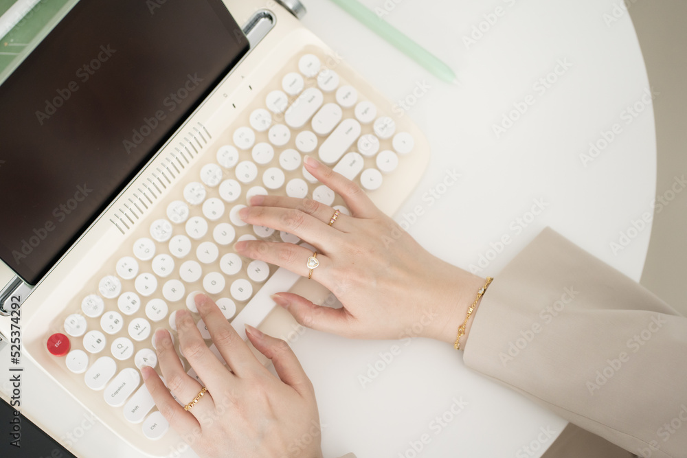 asian business and writer woman meeting online and typing by use retro keyboard and tablet asian business and writer woman meeting online and typing by use retro keyboard and tablet