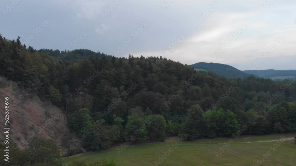 Mountain slope covered with forest. Subcarpathian region, Poland. Bird's-eye view. Mountain slope covered with forest. Subcarpathian region, Poland. Bird's-eye view.
