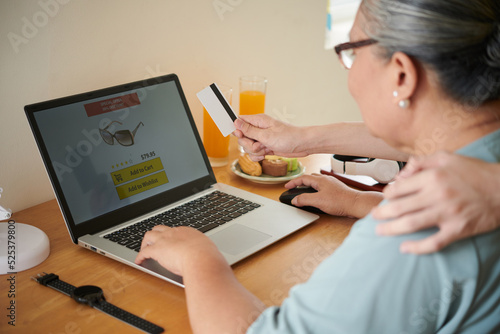 Son Teaching Senior Mother How to Shop Online