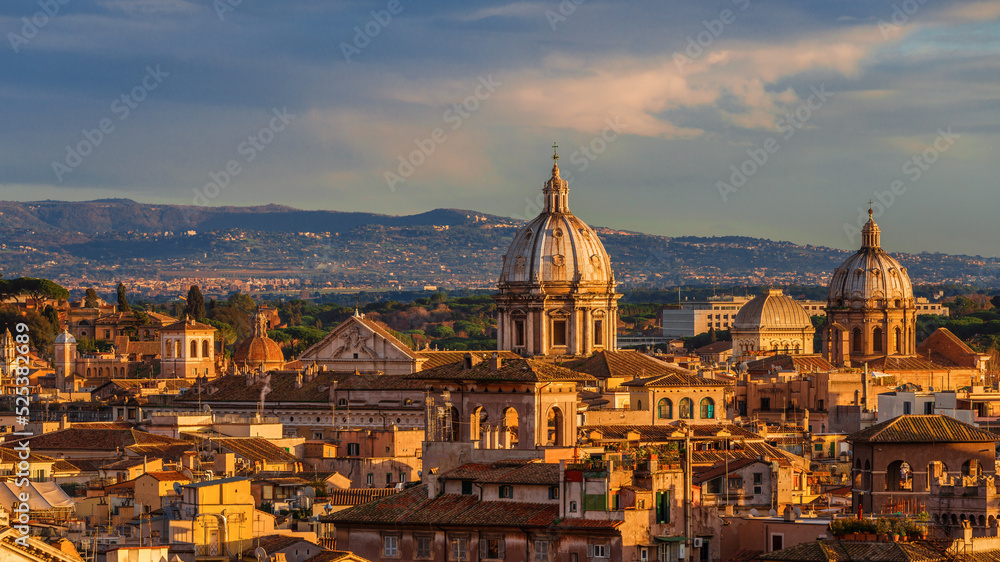 Panoramic view of Rome historical center old skyline at sunset with Church of St. Andrew of the Valley beautiful baroque dome