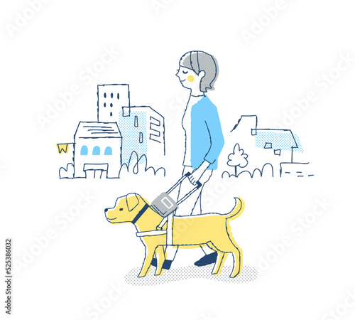 盲導犬と歩く視覚障がい者の女性