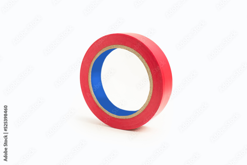 Skein of red electrical tape on a white background in the center of the image. Tool for insulating wiring in electrical systems. Reel of electrical tape for electrical work during construction Skein of red electrical tape on a white background in the center of the image. Tool for insulating wiring in electrical systems. Reel of electrical tape for electrical work during construction
