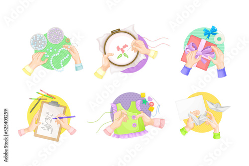 Set of human hands making diy crafts. Set of human hands making diy crafts. Top view of hands drawing, making origami, sewing and embroidering cartoon vector illustration