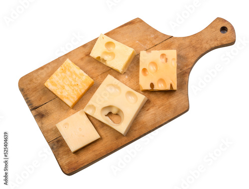 various types of cheese on wooden board photo
