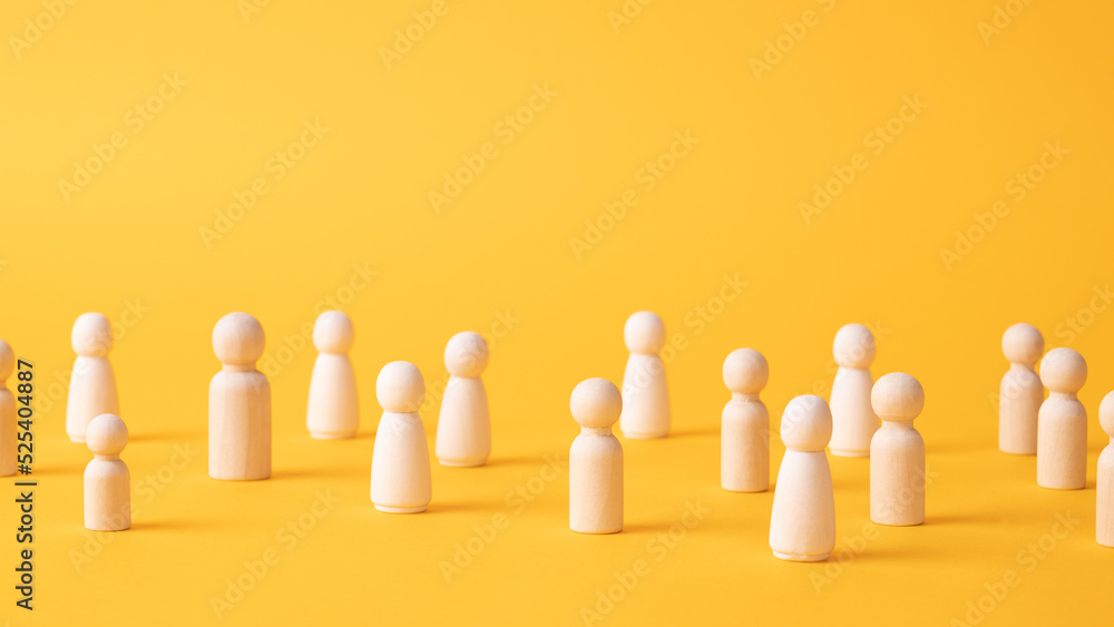 Many figures of people stand at a distance. People Society Concept. Behavior and social science relationships. Manipulation and management. Marketing, segmentation, consumer market research.