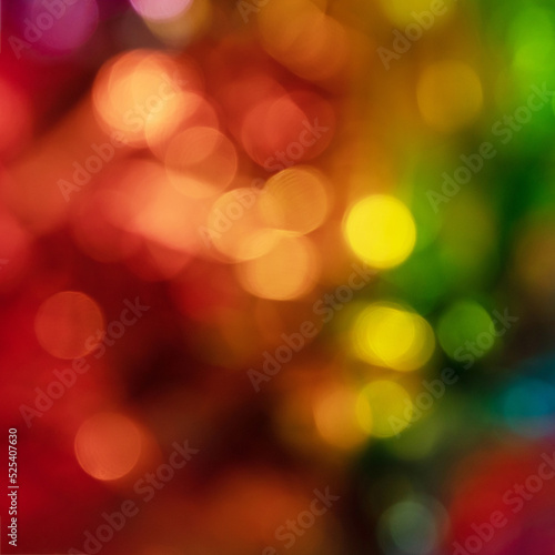 Blurred bokeh background for Christmas and New Year holiday. Abstract colorful wallpaper with defocused lights. Copy space