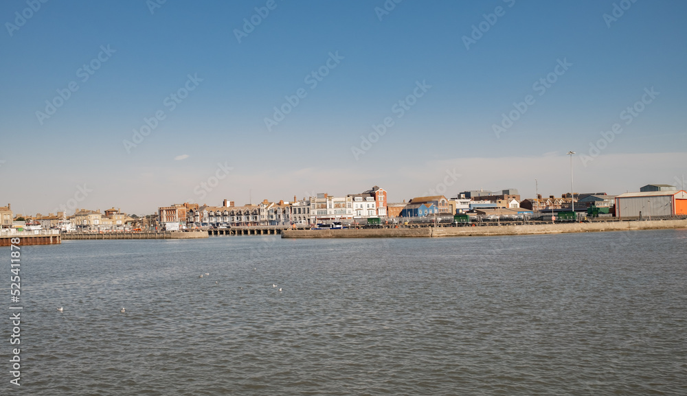 Lowestoft, Suffolk, UK – August 14 2022. Lowestoft docks and harbour on the Suffolk coast. Captured on a bright and sunny morning