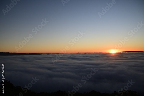 sunrise above clouds