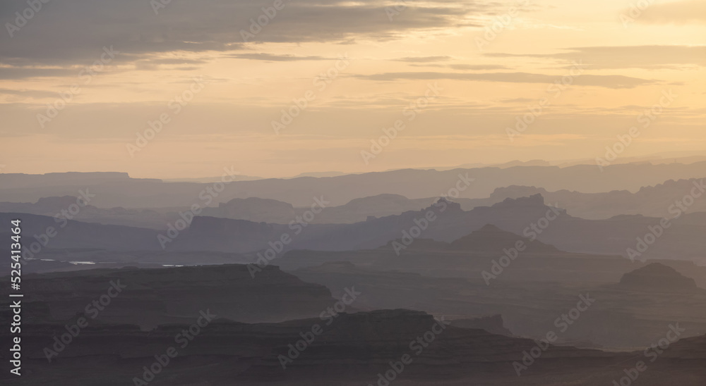 Scenic American Landscape and Red Rock Mountains in Desert Canyon. Spring Season. Canyonlands National Park. Utah, United States. Nature Background. Sunset Scenic American Landscape and Red Rock Mountains in Desert Canyon. Spring Season. Canyonlands National Park. Utah, United States. Nature Background. Sunset
