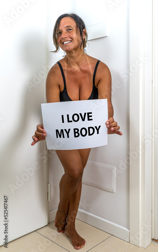 Obraz na plátně image of a beautiful middle aged woman posing in her apartment - Concept about b