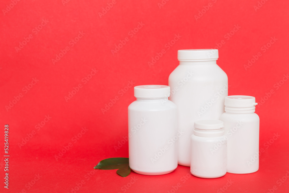 supplement pills with medicine bottle health care and medical top view. Vitamin tablets. Top view mockup bottle for pills and vitamins with green leaves, natural organic bio supplement, copy space supplement pills with medicine bottle health care and medical top view. Vitamin tablets. Top view mockup bottle for pills and vitamins with green leaves, natural organic bio supplement, copy space