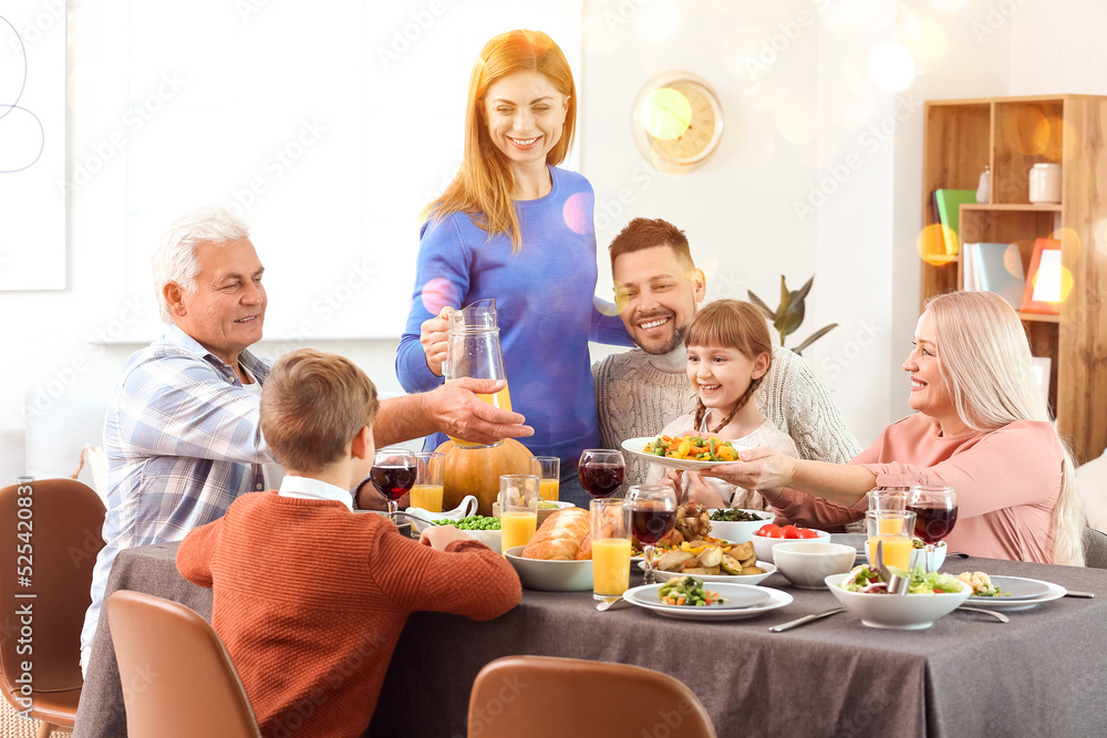 Family celebrating Thanksgiving Day at home