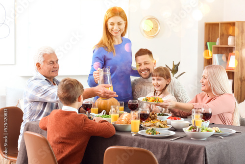 Family celebrating Thanksgi...
