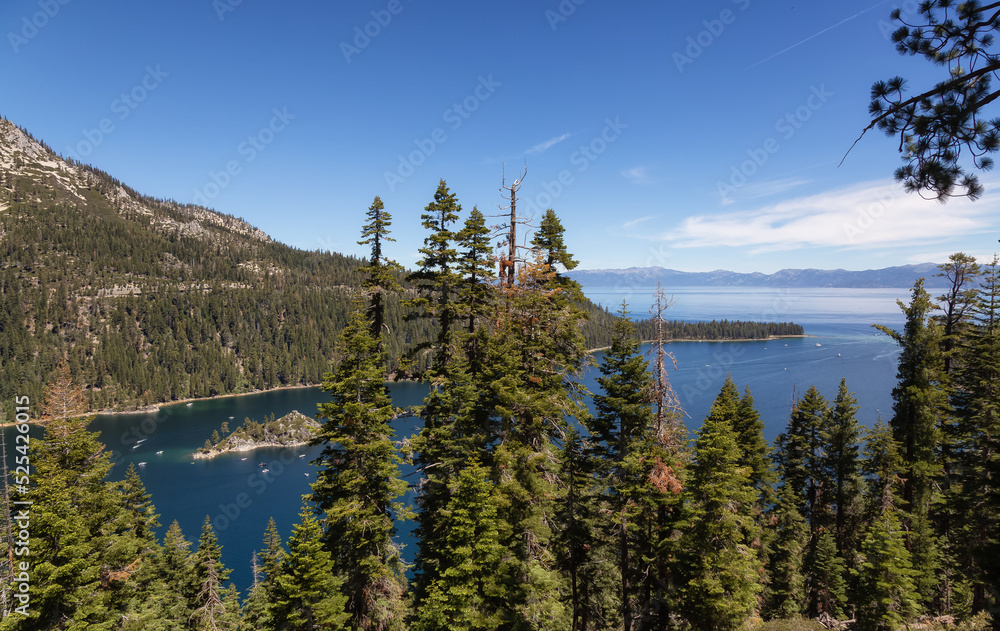 View of Large Bay and Lake with Boats, Small Island, Trees and Mountains. Summer Season. Emerald Bay, Lake Tahoe. California, United States. Nature Background.