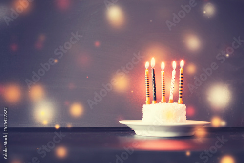 Photography anniversary, birthday background with  festive cake with candles