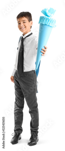 Little boy with school cone...