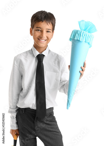 Little boy with school cone...
