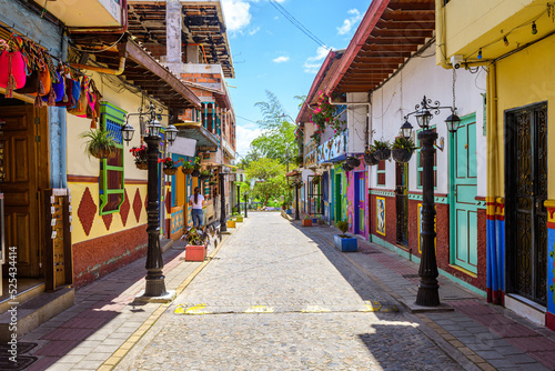 colorful street of guatape colonial town, colombia photo
