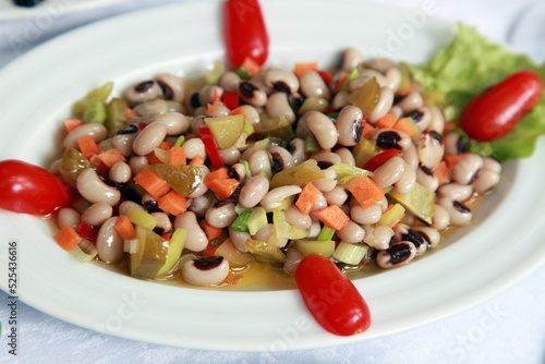 Turkish appetizer food 'Kidney Bean' (Turkish: Borulce) on the dinner plate.