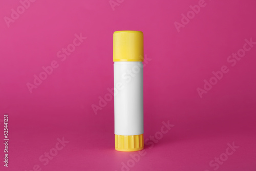 Fotografia, Obraz New blank glue stick on fuchsia background