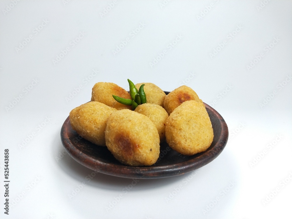 Comro or Combro is a typical Sundanese fried food, West Java, Indonesia. Comro or Combro is made from grated cassava which is shaped round or oval and filled with chili oncom and then fried.