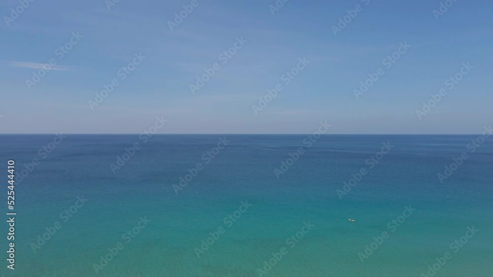 Aerial view sea horizon as far as the eye can see One part sky, one part sea Nature video 4K ProRes HQ 4:2:2 Tropical sea Andaman sea Location Phuket Thailand. Nature and Go Everywhere travel concept. Aerial view sea horizon as far as the eye can see One part sky, one part sea Nature video 4K ProRes HQ 4:2:2 Tropical sea Andaman sea Location Phuket Thailand. Nature and Go Everywhere travel concept.