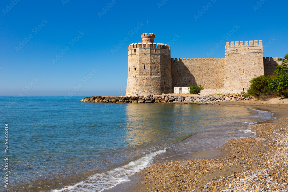 Stone walls of Mamure Castle on Mediterranean coast. Anamur, Mersin Province, Turkey.