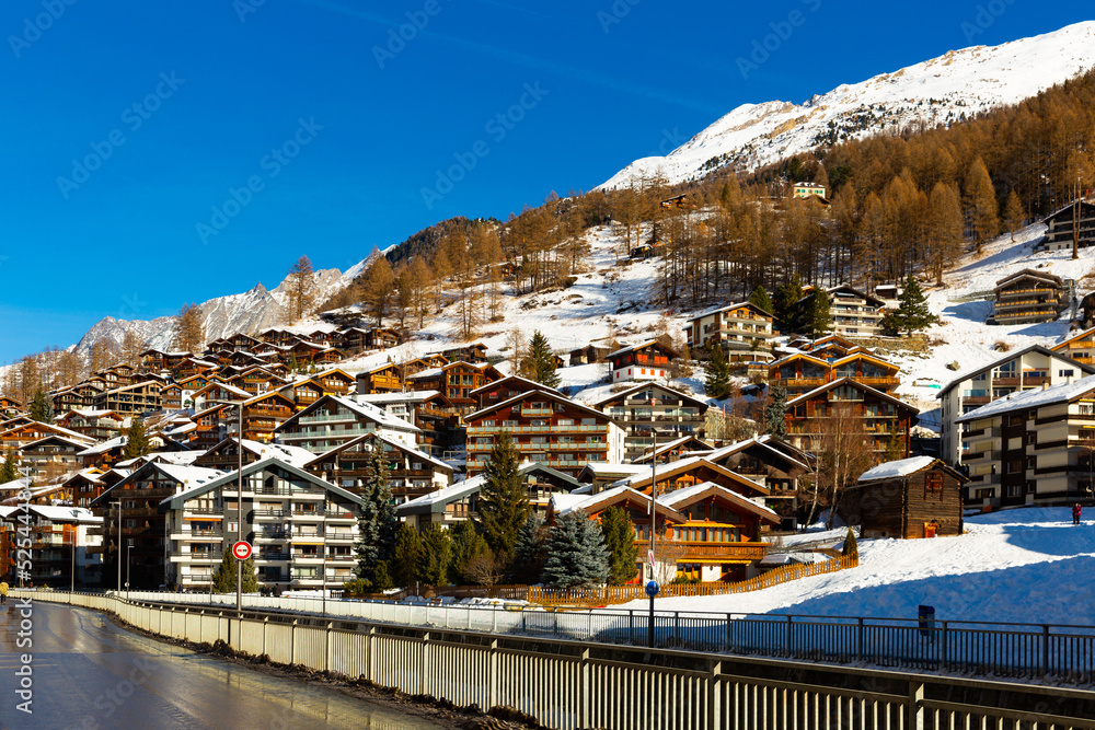 Swiss village of Zermatt in winter on sunny day, Alps mountains, Switzerland