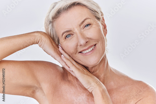 Skincare  clean and happy senior woman face resting on hands in a studio portrait. Elderly beauty skin care model posing or showing bedtime routine for perfect  healthy looking or wrinkle free aging