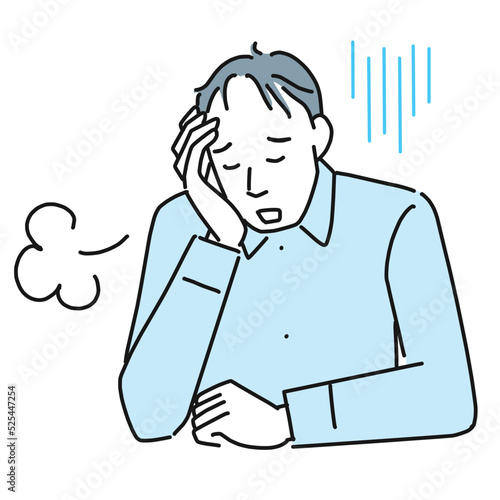 薄毛が気になって落ち込む男性