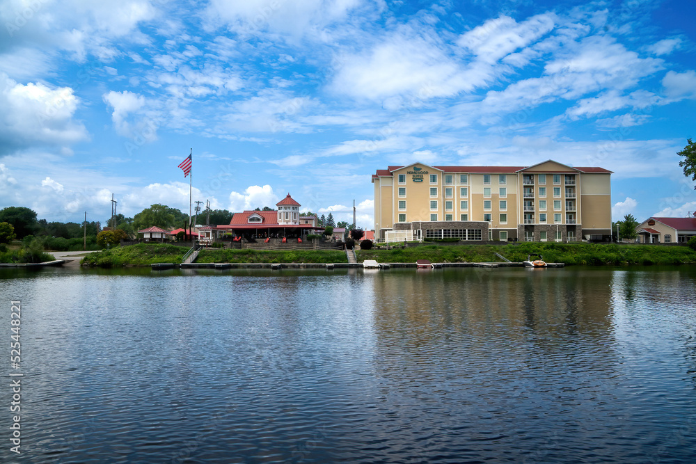 Schenectady, NY – USA - Aug 5, 2022 Horizontal afternoon view of the Homewood Suites by Hilton in Schenectady, set along the Mohawk River, this relaxed all-suite hotel is 7 miles from Interstate 90