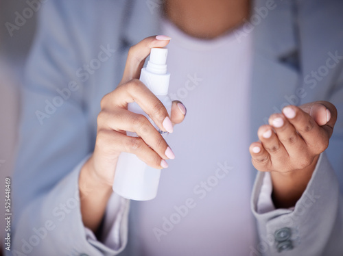 Health, covid and cleaning hands business woman, hygiene female spray hand to help prevent spread of coronavirus. Worker, leader or corporate person spraying cleaner to clean and remove germs