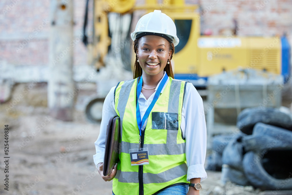 Happy engineer, construction worker or architect woman feeling proud