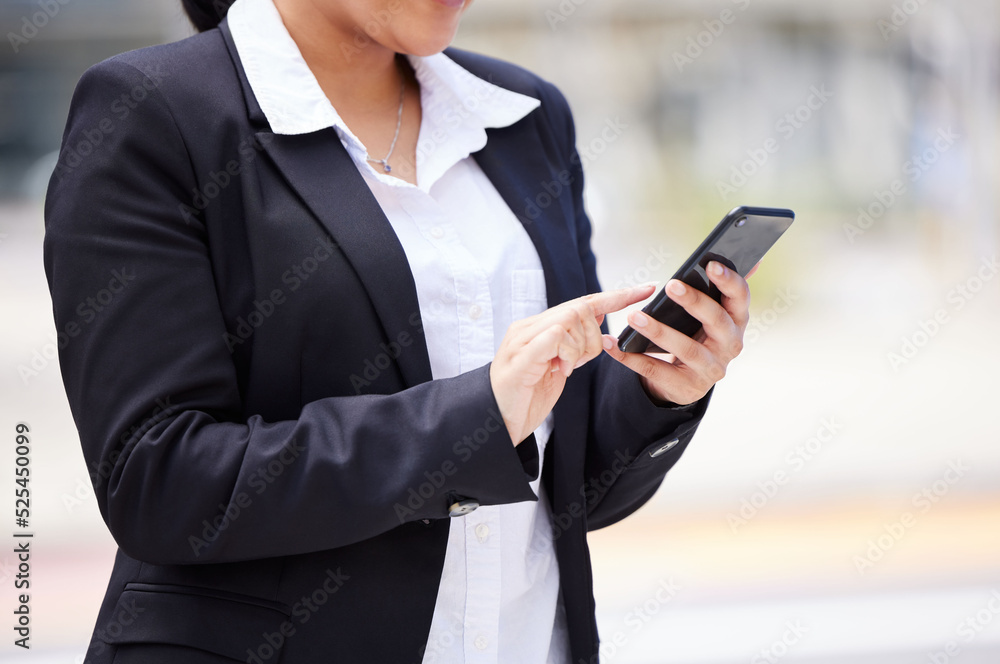 Online, networking business woman in a suit and smartphone reading email communication, WhatsApp or mobile project management app on the go. Corporate professional hands typing on smartphone in city Online, networking business woman in a suit and smartphone reading email communication, WhatsApp or mobile project management app on the go. Corporate professional hands typing on smartphone in city