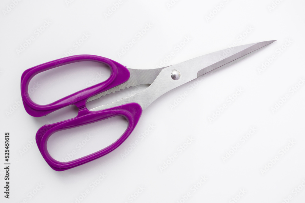 Purple scissors isolated on white background. Purple scissors isolated on white background.