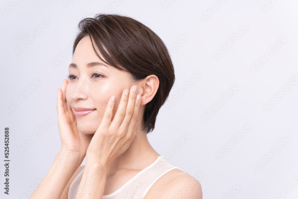 Skin care. Woman with beauty face touching healthy facial skin portrait. Asian woman. Skin care. Woman with beauty face touching healthy facial skin portrait. Asian woman.