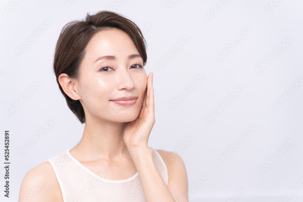 Skin care. Woman with beauty face touching healthy facial skin portrait. Asian woman. Skin care. Woman with beauty face touching healthy facial skin portrait. Asian woman.