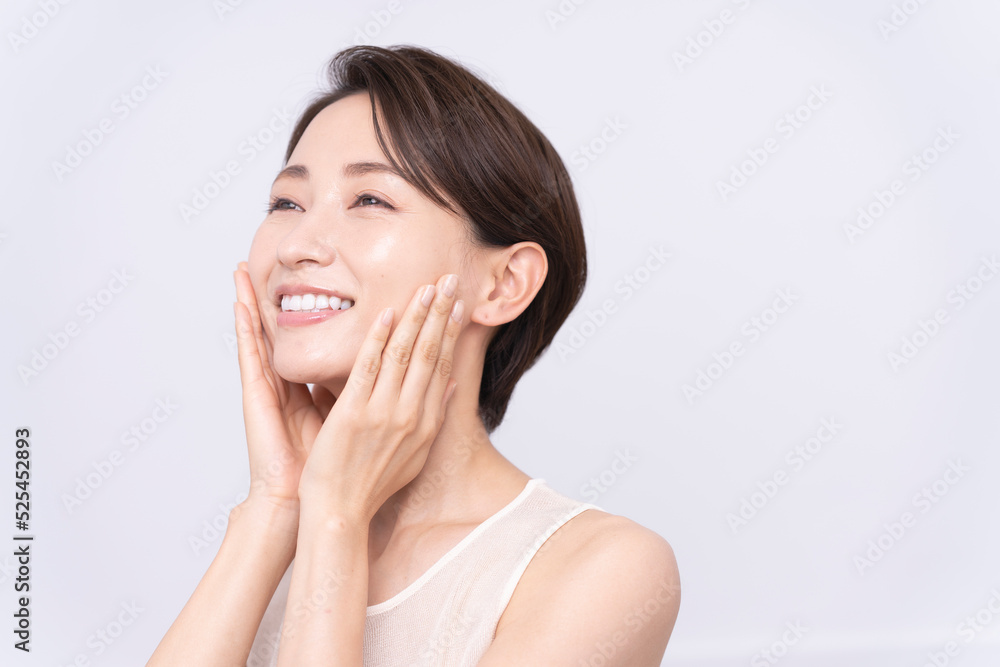 Skin care. Woman with beauty face touching healthy facial skin portrait. Asian woman. Skin care. Woman with beauty face touching healthy facial skin portrait. Asian woman.