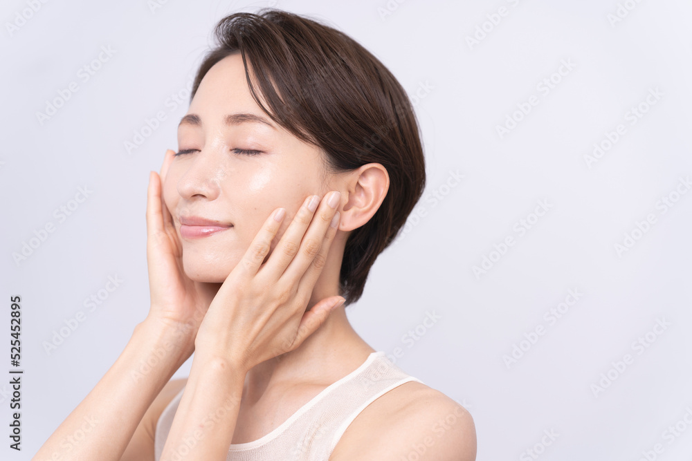 Skin care. Woman with beauty face touching healthy facial skin portrait. Asian woman. Skin care. Woman with beauty face touching healthy facial skin portrait. Asian woman.
