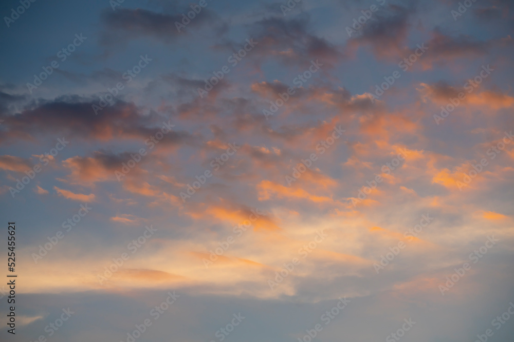 Orange clouds at sunset. Natural sky background. High quality photo