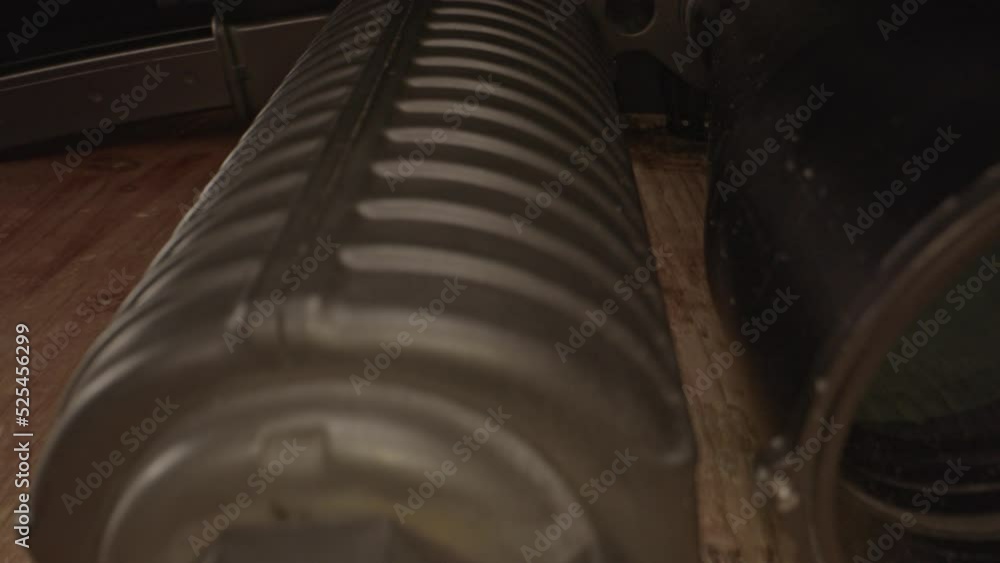 Amazing dolly in of a scoped AR-15 assault rifle barrel and towards ...