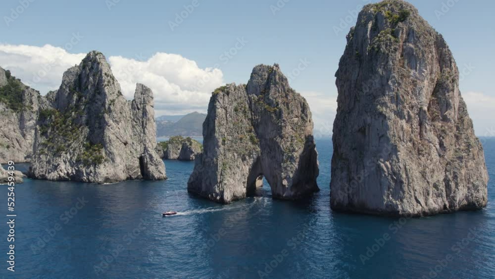 Faraglioni Sea Stack Natural Arch Rock Formation on Capri Island, Italy Faraglioni Sea Stack Natural Arch Rock Formation on Capri Island, Italy