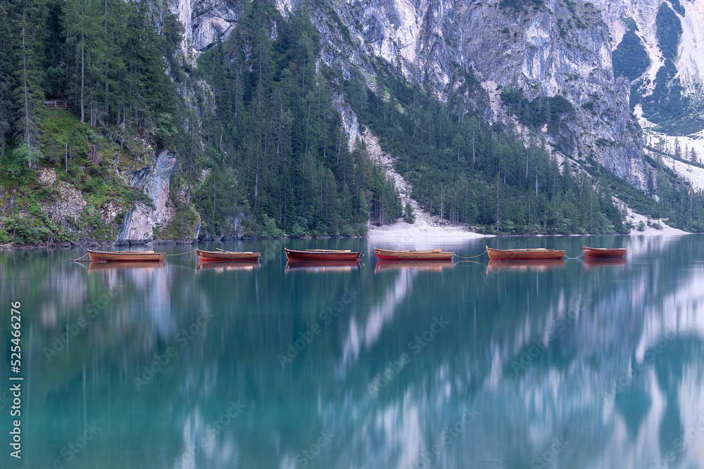 boats in lake of Lago di braies Dolomites