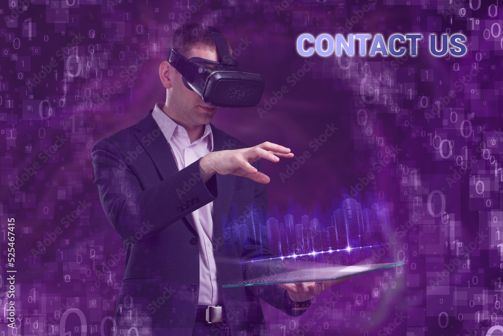 Business, Technology, Internet and network concept. Young businessman working on a virtual screen of the future and sees the inscription: Contact us