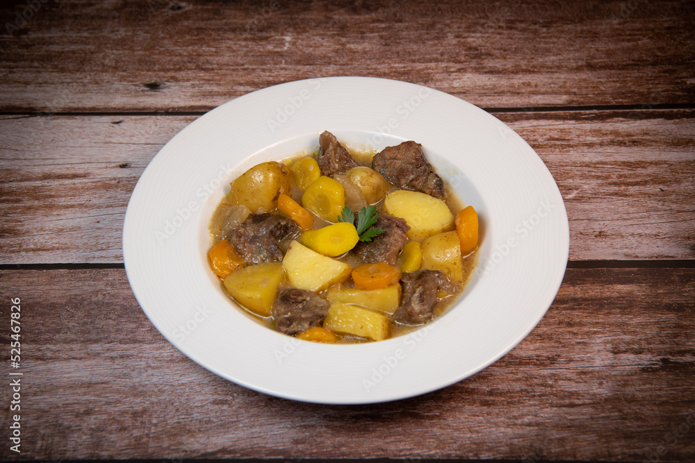 Recipe for beer and mustard beef chuck stew with potatoes, turnips and carrots, High quality photo Recipe for beer and mustard beef chuck stew with potatoes, turnips and carrots, High quality photo